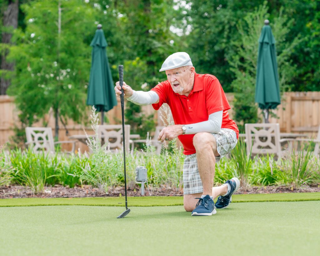 Senior golfing