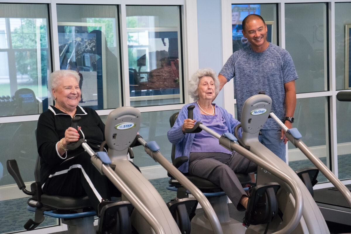 Elderly women working out in a gym