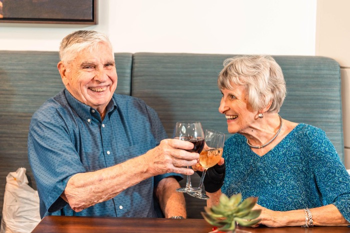 Elderly Couple cheersing