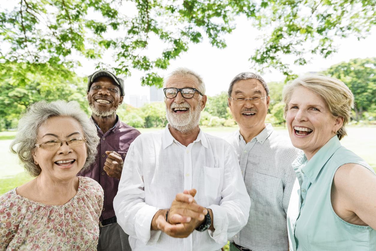 Group of happy smiling seniors enjoy a beautiful day