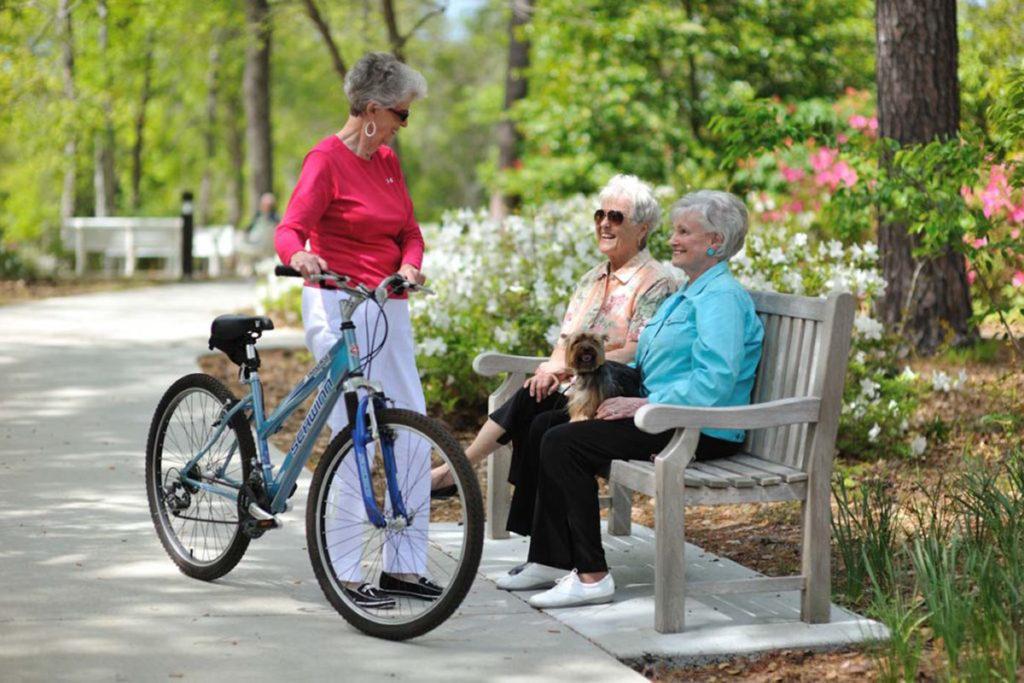 Residents of Porters Neck Village socializing outside.